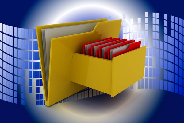 Image of a yellow file drawer on blue background with a white grid behind it that symbolizes digitization